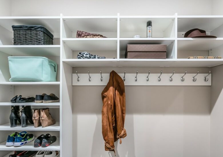 Mudroom custom closet with bench and coat hooks