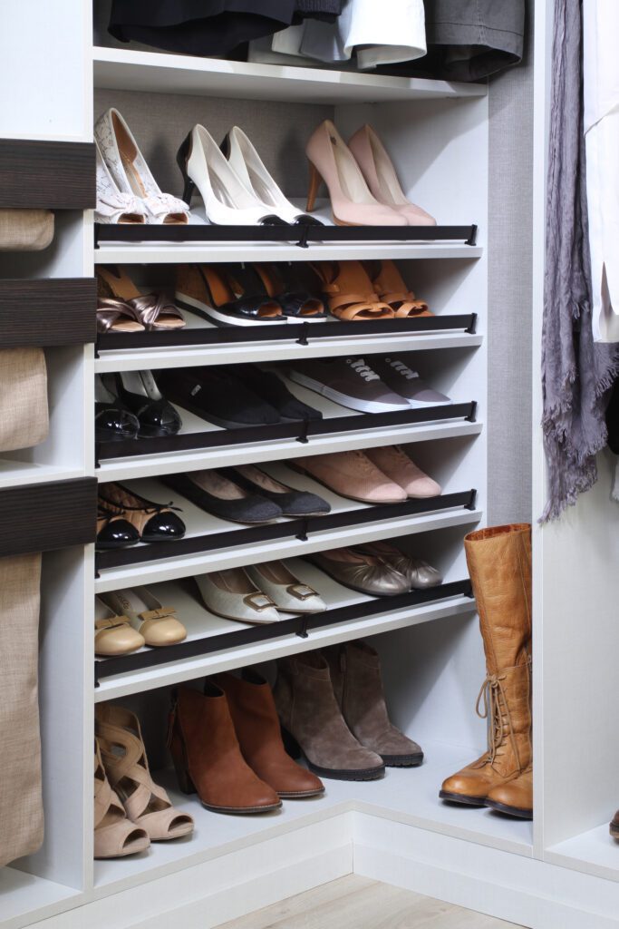 custom shoe closet with heels and boots